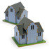 A wooden model of a house featuring a blue exterior, grey roof with shingles, and a green base. It has a logo.