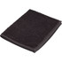 A black gym towel with a textured surface, folded neatly. It has a simple design with a subtle logo.