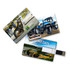 A set of three credit card-sized flash drives featuring various images and a logo, with vibrant colours and designs.