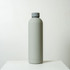 A drink bottle in matte grey with a screw-top lid and a minimalist design. It features a logo on the side.