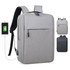 A grey Wirra Backpack with multiple compartments, featuring a USB charging port and a sleek design.