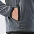 A grey men's fleece jumper featuring a quarter zip and side pockets with a logo.