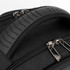 A black backpack featuring a textured handle and double zippers. It has a sleek, durable design.
