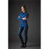 A blue plaid women's button-up shirt with a snap front, paired with skinny jeans and ankle boots.