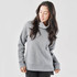 A grey cowl neck pullover with long sleeves and a relaxed fit, featuring a subtle logo.
