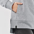 A grey women's cowl neck pullover featuring a side slit and a pocket at the hip, with a small logo tag.