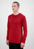 A red long sleeve tee displayed on a model, featuring a simple design and a logo.