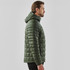 A olive green puffer jacket with a hood, featuring a quilted design. It has a logo on the garment.
