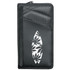 A black travel wallet with a textured surface and a decorative surfboard design, featuring a logo.