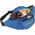 A blue fanny pack containing sunglasses, a wallet, a phone, and a brochure, featuring a logo.