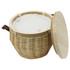 A wicker cooler basket in natural tones, with a light-coloured fabric lining and a wooden lid. It has leather handles.