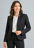 A navy women's cool stretch short jacket with reverse lapel, featuring two buttons and styled with a white top.