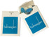 A cardboard box with a flip lid containing blue and white jelly beans. The box has a logo on it.