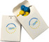 A white cardboard box with a blue and yellow chewy fruit inside, featuring a logo on the front.