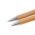 A pair of Eco Bamboo Pens with silver accents and a natural bamboo finish. Features a logo on the barrel.