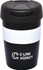 A black double wall travel mug with a white band and a lid, featuring a logo.