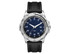 A sports watch with a silver stainless steel case, a dark blue dial, and a black silicone strap. It features a logo.