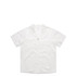 A white short-sleeved pyjama top with a collar and buttons, featuring a logo on the fabric.