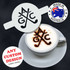 A coffee cup featuring a frothy beverage topped with a stencil pattern. The cup is white against a dark background.