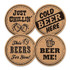 Four round cork coasters featuring printed phrases and images of beer mugs, set on a light background.