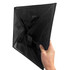 A black laundry basket with a triangular shape and handles, made of durable material. It features a logo.