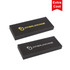 A black packaging box with the brand logo displayed in gold and silver. Two boxes are shown.