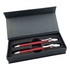 A red metal pen gift set featuring two pens, displayed in a black presentation box with a fitted interior.
