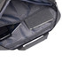 A grey laptop bag interior featuring a phone, passport, and notebook in separate compartments.