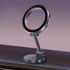 A sleek black and silver magnetic car phone holder with an adjustable arm and circular mount.