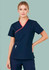 A women's scrub top in navy with contrast red detailing, featuring a crossover design and a logo.