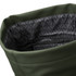 A soft-touch, olive green flap backpack with a patterned black interior and a zippered pocket inside.