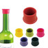A drink bottle with a pink silicone wine stopper, surrounded by stoppers in red, yellow, green, purple, and blue.