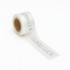 A roll of clear adhesive ribbon with a silver "Good Luck" message printed across it.