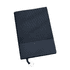 A navy leather notebook with a ribbed texture and a smooth bottom section, featuring an elastic closure.