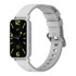A slim smart watch with a black face and vibrant green details, featuring a grey strap and a branded logo.