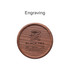 A round wooden coaster featuring an engraved design with a tea cup and branding elements. The colour is a rich brown.