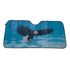 A foldable car sunshade featuring a blue sky design with an eagle in flight and branding.