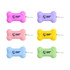 A collection of silicone bone-shaped dog poop bag dispensers in pink, purple, yellow, blue, and green, each with a logo.