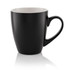 A black mug with a curved handle and a smooth finish, featuring a contrasting lighter interior.