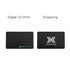 A black metal business card featuring a logo, with options for digital UV print and engraving on either side.