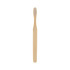 A large flat handle toothbrush with a bamboo handle and white bristles, featuring a textured grip and no visible branding.