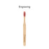 A bamboo toothbrush with a large flat handle and pink bristles, featuring a logo on the handle.
