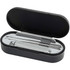 A sleek black manicure set containing nail clippers, a nail file, and a cuticle pusher in a compact case.