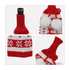 A drink bottle is covered with a custom knitted wine bottle sleeve in red and white, featuring pom-poms and snowflake patterns.