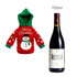 A drink bottle covered with a festive red and green knitted design featuring a snowman and Christmas motifs.