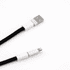 A black charging lanyard with white connectors at both ends, featuring a USB and a Lightning connector.