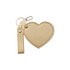 A gold heart-shaped compact mirror with a keychain attachment and a wrist strap. It features a simple metallic texture.