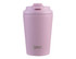 A pink insulated coffee cup with a ceramic lining and a lid, featuring a logo on the front.