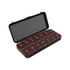 A 7-day pill organiser in black with compartments for each day of the week, featuring AM and PM sections.