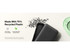 A black power bank with an integrated cable, featuring a logo and made from recycled plastic.